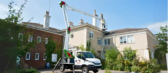 using our cherry picker on a commercial gutter cleaning job in Leicester